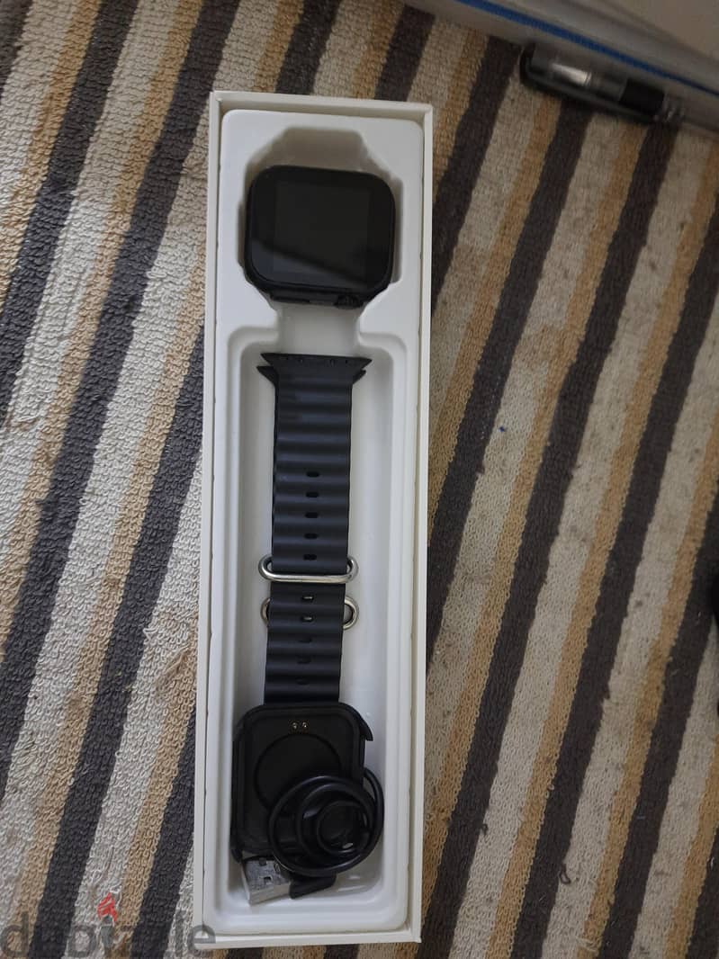 Ultra Watch 8 . . . it's with the box and charger and strap 1