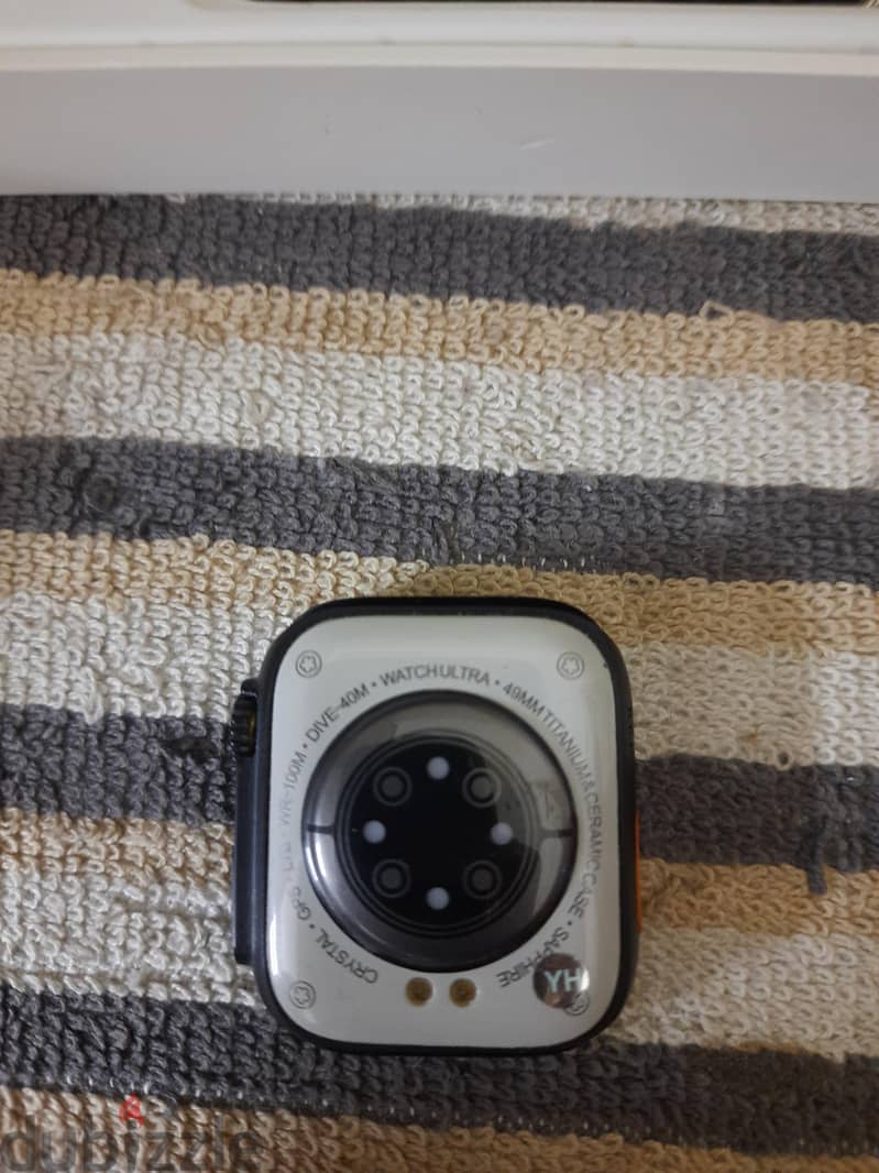 Ultra Watch 8 . . . it's with the box and charger and strap 3