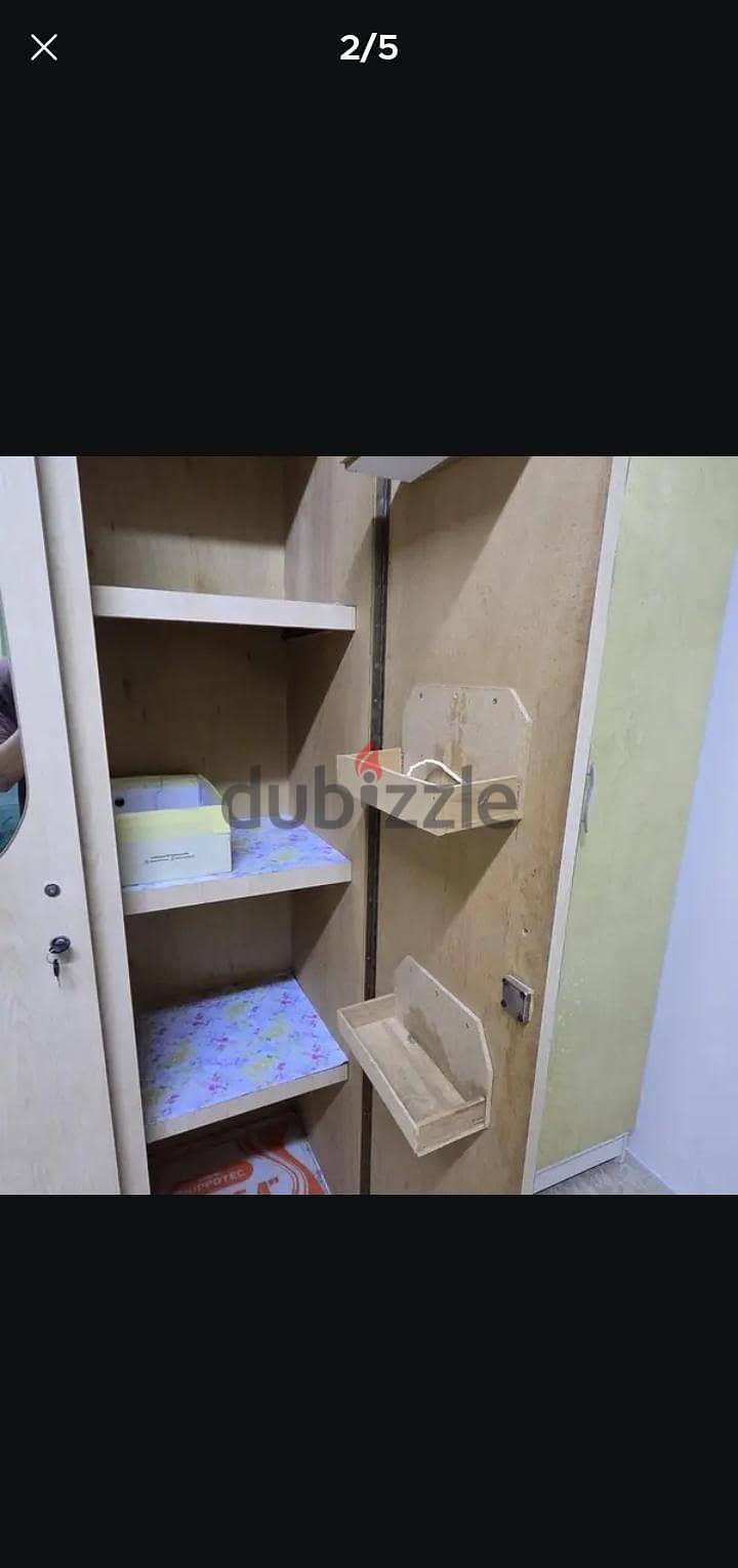 3 door cupboard 1