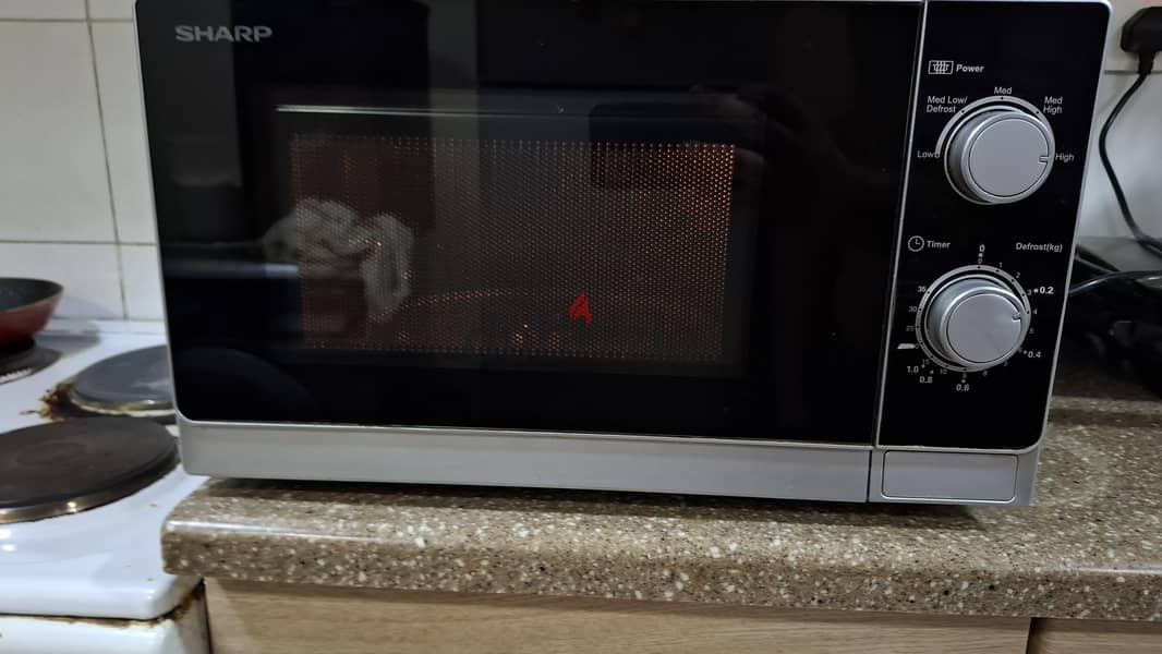 sharp microwave for sale only for 24 bhd 2