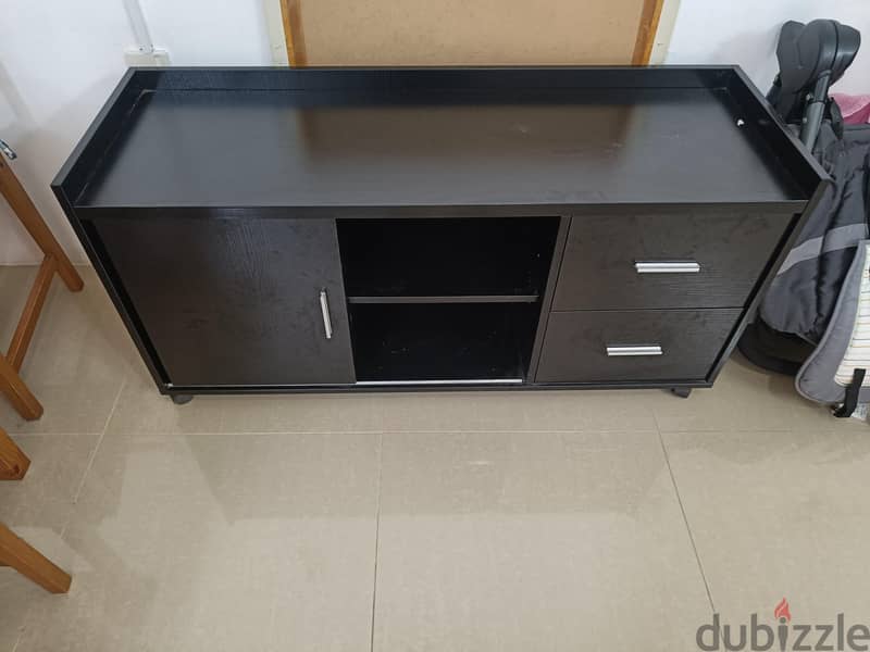 TV Table used in almost new condition without delivery. 1