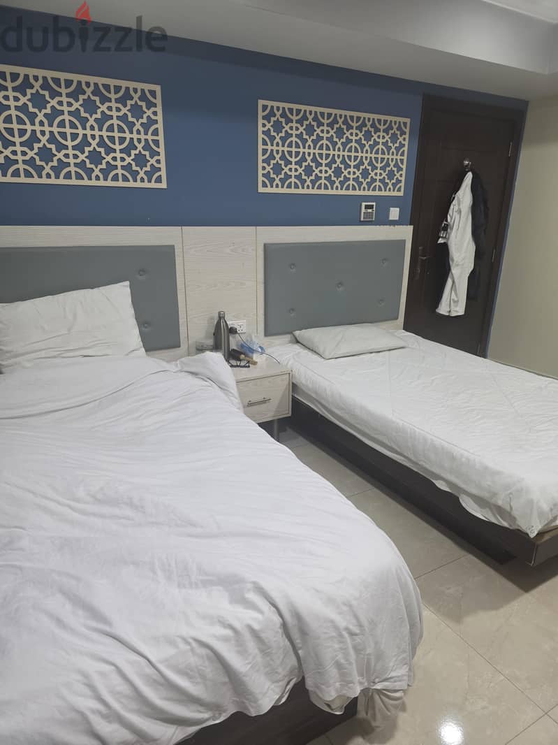 Need room partner in 2 BHK hoora Exhibition Road 32233125 9