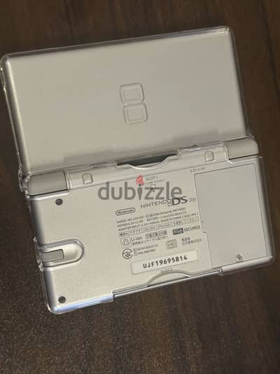 Dslite for sale used very Good condition with 32gb cart games