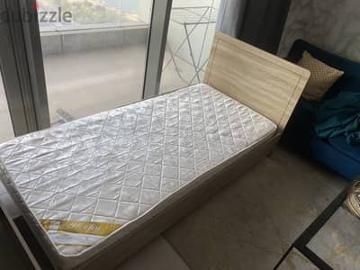 Wooden bed with free mattress