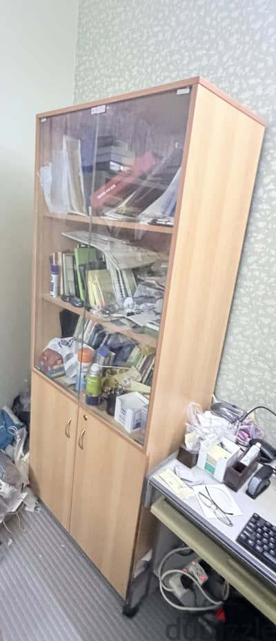 Glass display/ storage cabinet