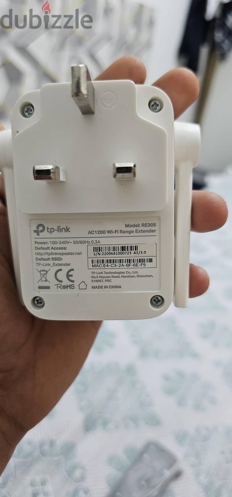 TP-Link AC1200 Wi-Fi Range Extender (Model: RE305). 1