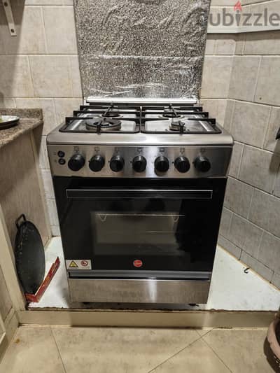 4 Burner cooker with oven for sale only 4 months. used