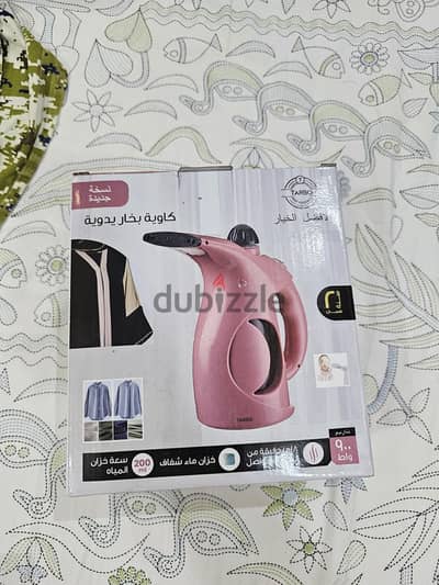 Steam iron never used in box