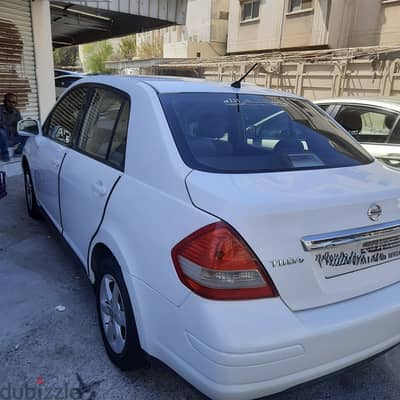 Nissan tiida.   BD 1300/-