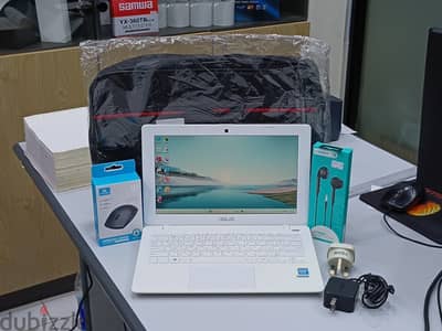 Asus Intel Celeron 2.16 GHz RAM, 4GB 160GB SSD, 11.6” HD with GIFT