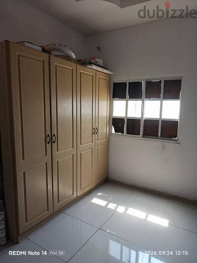 Room Available for Sharing in Family Flat – Hamad Town