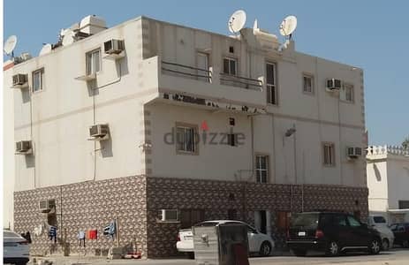 للبيع بناية في منطقة المرخ مناسبة للاستثمار