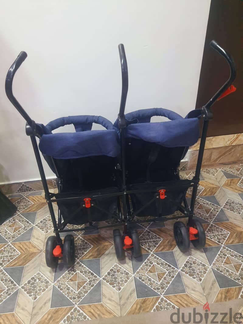 Call (36216143) Baby Double Stroller In Good Condition Easy To fold an 2