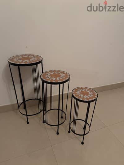 Set of 3 nesting wrought iron tables with mosaic tile top.