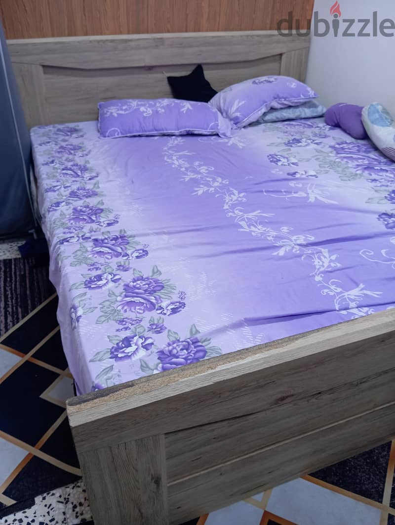 queen size (homebox) bed without mattress. 1