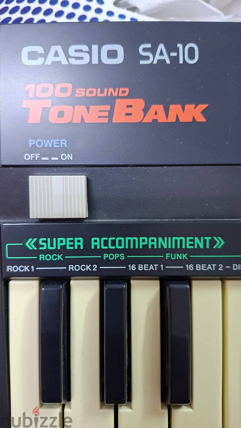 Casio SA-10 ToneBank Keyboard, a vintage Japanese-made 32-key mini key 1