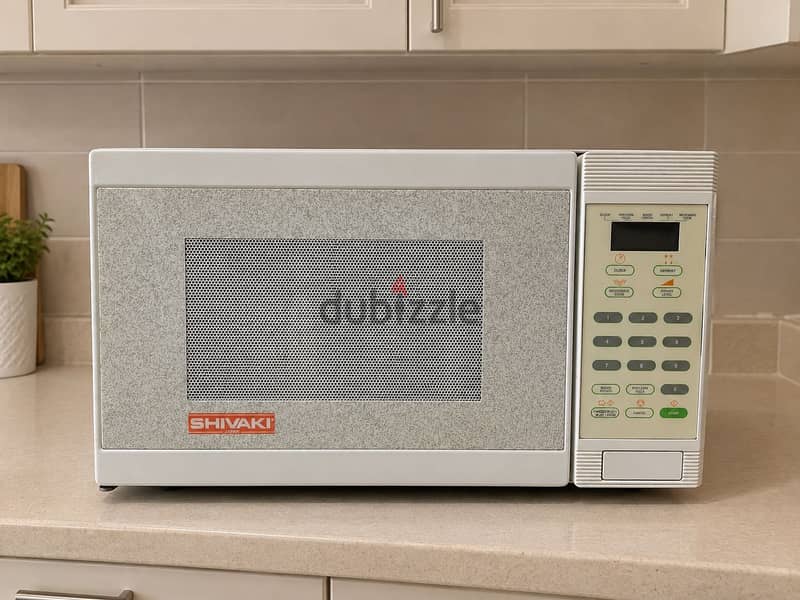 Shivaki microwave oven. فرن ميكروويف شيفاكي 2