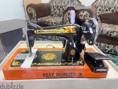 Singer sewing machine with electric motor