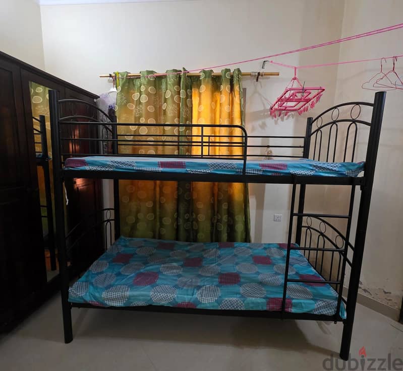 iron bunk bed with 2 single matress with cover for sell 1