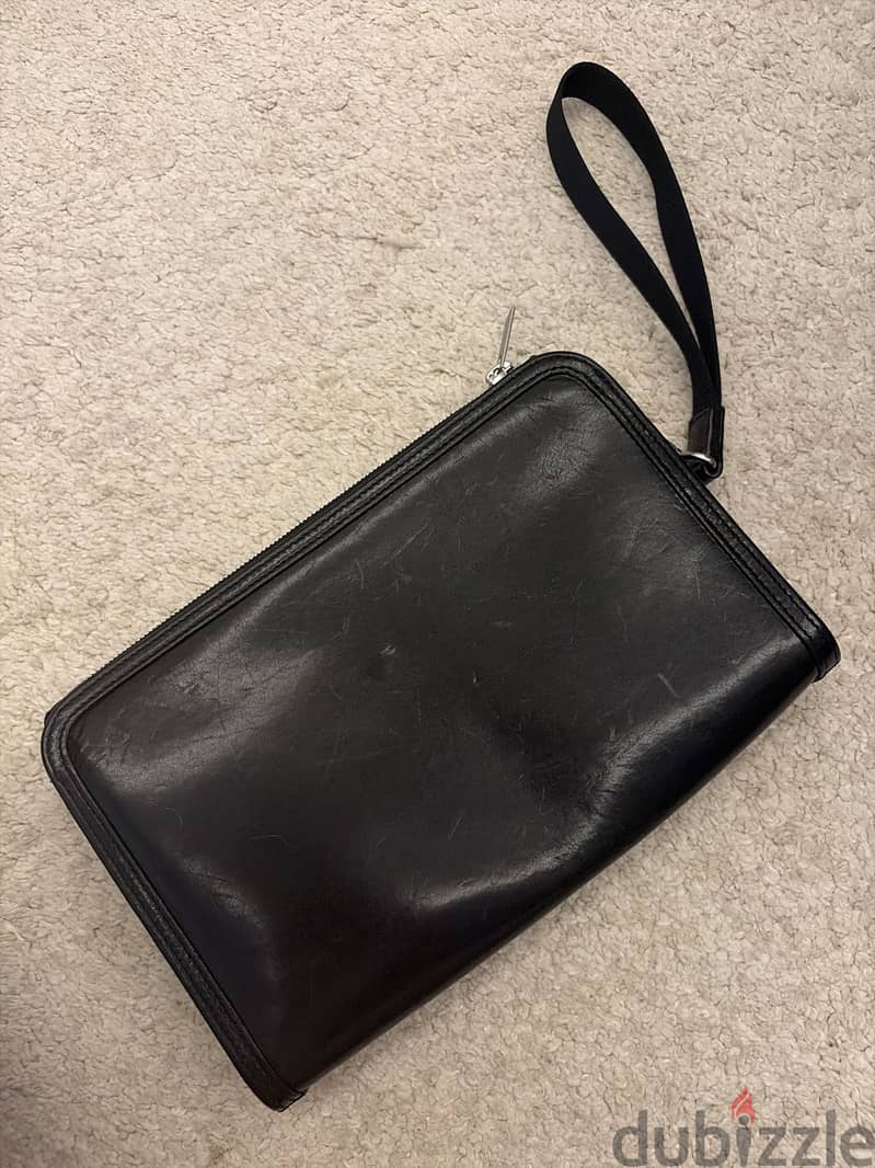 Porter Yoshida clerk clutch 1