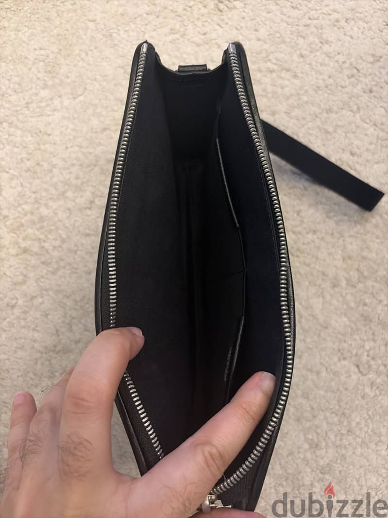 Porter Yoshida clerk clutch 2