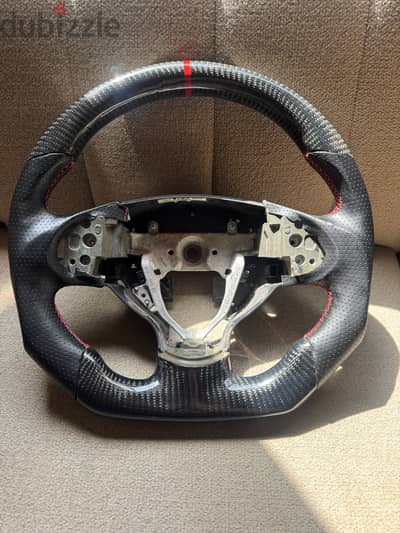 Carbon fiber sterring fits on lancer and pajero 65 bd fix price