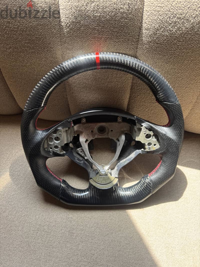 Carbon fiber sterring fits on lancer and pajero 65 bd fix price 2