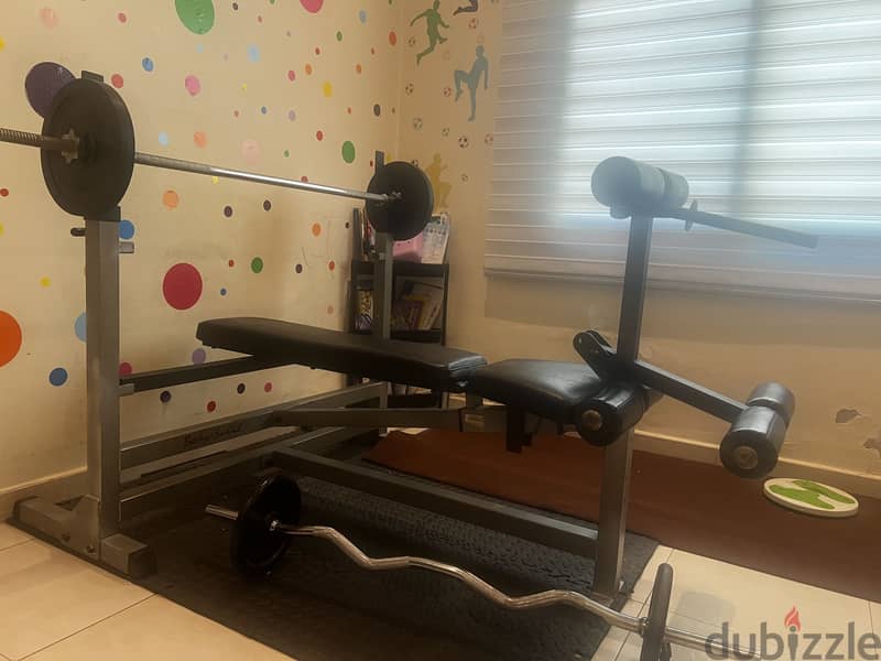 Body solid bench, rod and weights 1