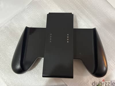 Not original. JoyCon grip Non charging Piece accessory