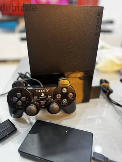 Playstation 2 slim مبرمج مع هاردسك