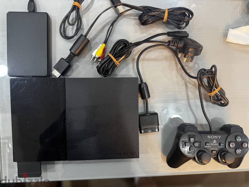 Playstation 2 slim مبرمج مع هاردسك 1