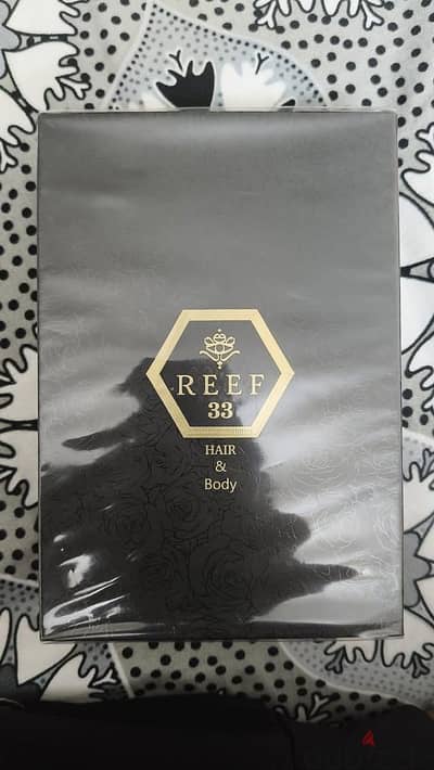 33 Hair & Body Mist (50 ml) by Reef Perfumes.