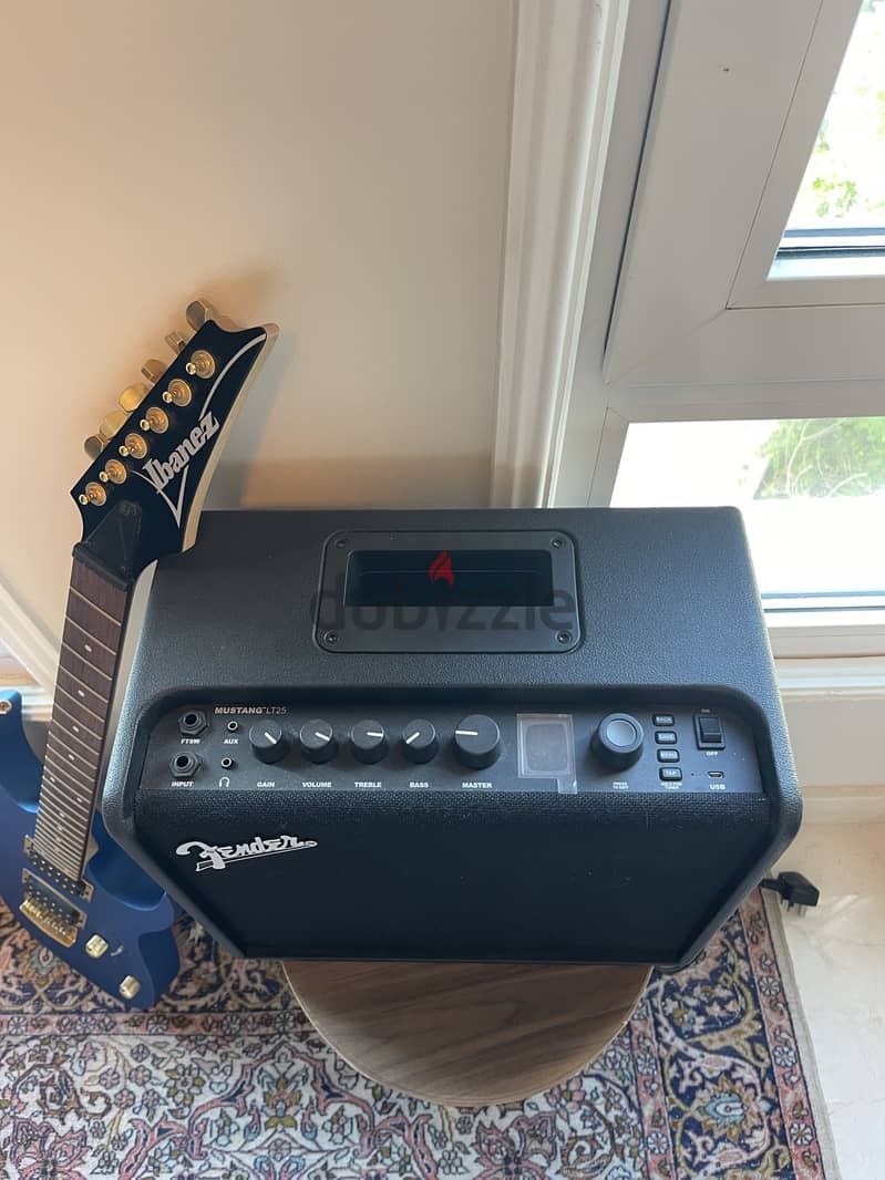 Ibanez RG Electric Guitar (Metallic Blue, Gold Hardware) + Fender AMP 2