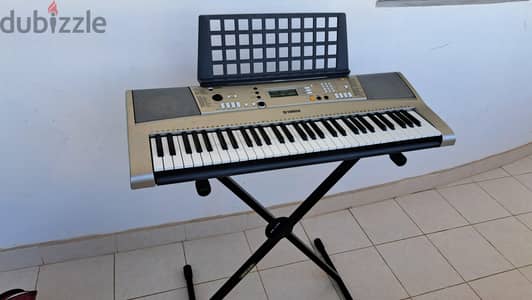 The Yamaha PSR-E313 is a 61-key entry-level portable digital keyboard