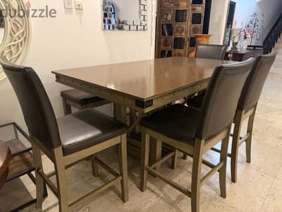 Dining table with 4 chairs and bench 145 BHD