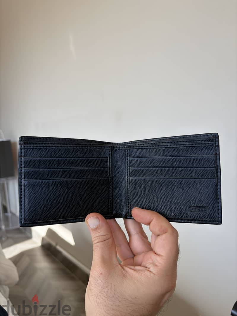 Two coach mens wallets 1