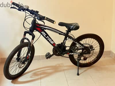 4 -5yr riding bicycle