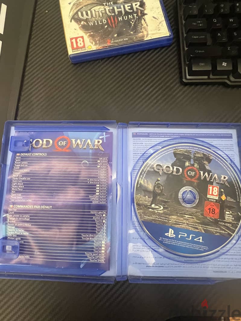 للبيع شريطين PS4 | The Witcher 3 وGod of War بسعر 9 دنانير فقط 2