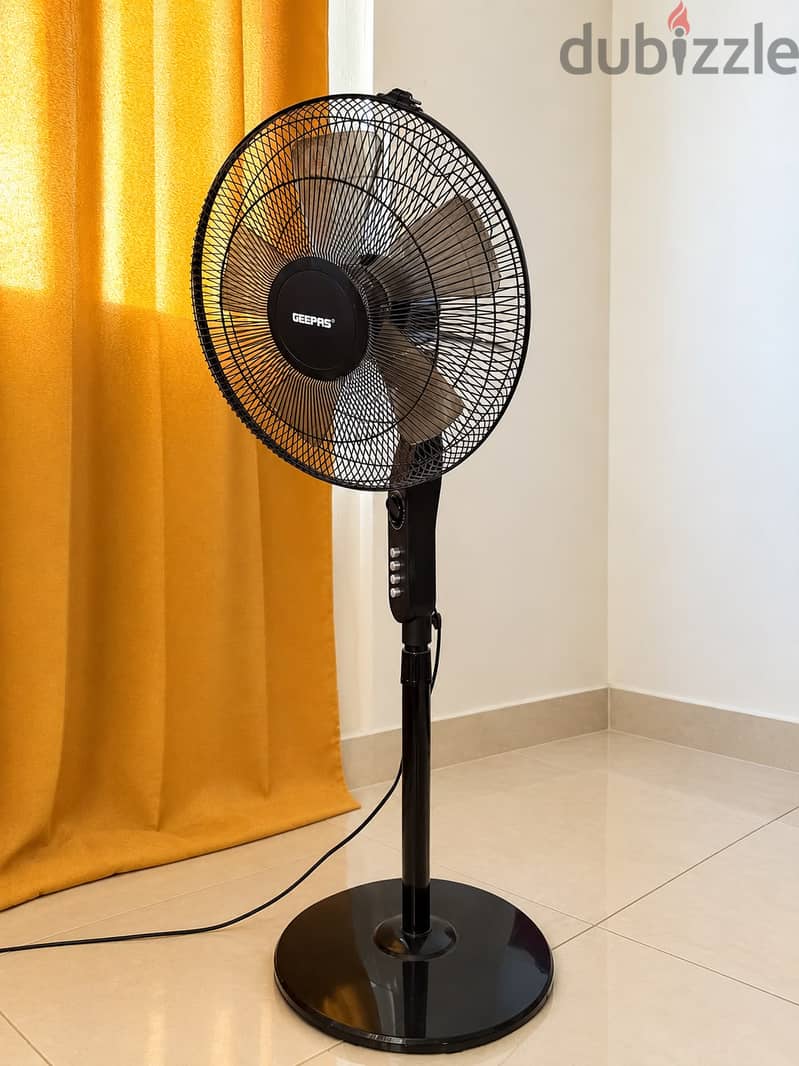 2.5 Ton Ac for sale & Standing Fan 2