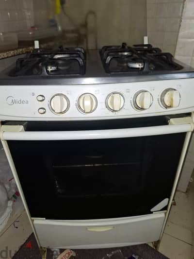 4 burner oven for sale with gas cylinder 35bhd