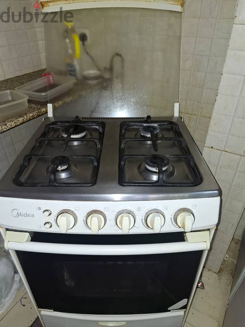 4 burner oven for sale with gas cylinder 35bhd 2