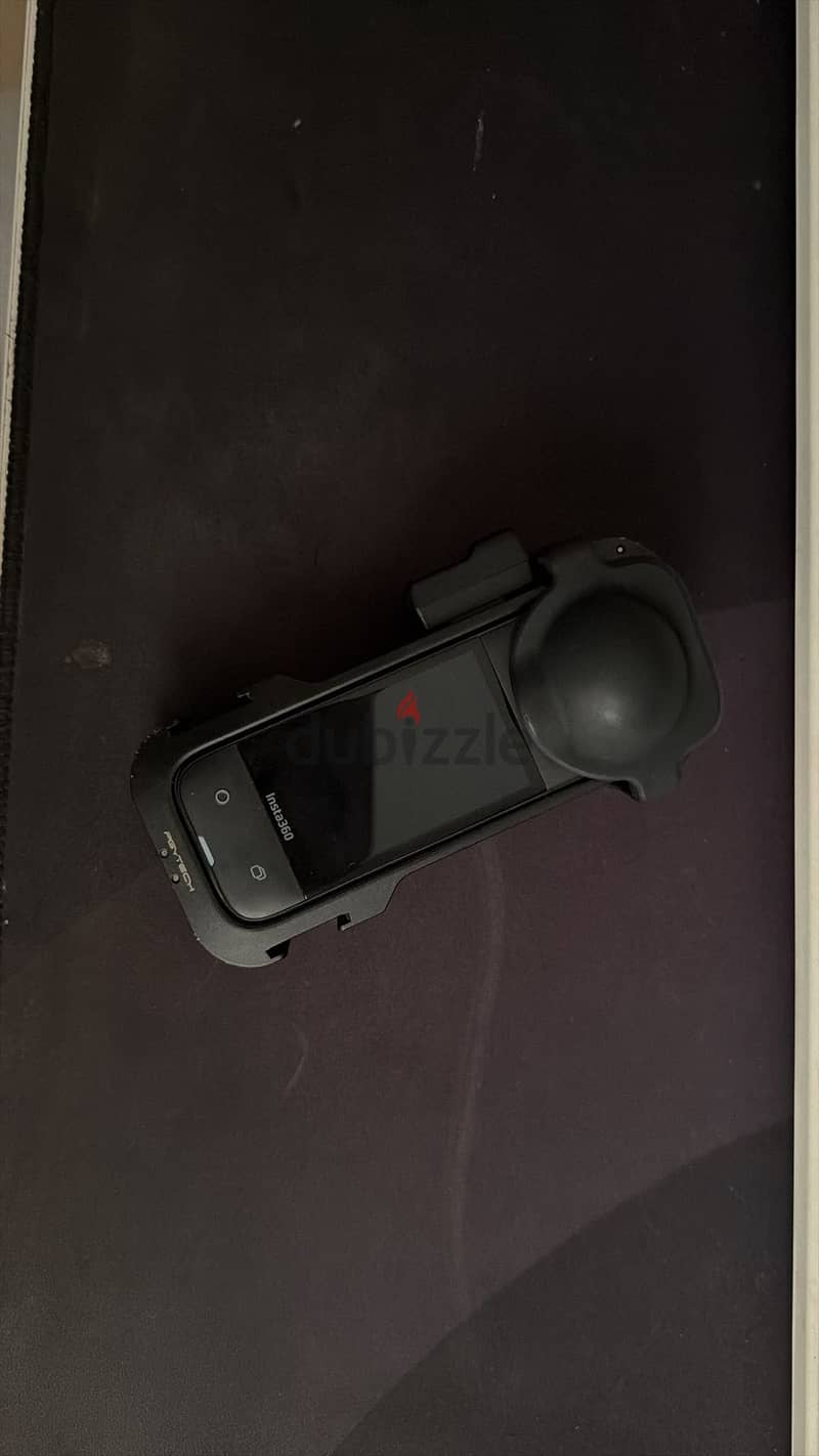 insta360 x4 with mic adapter and cage 4
