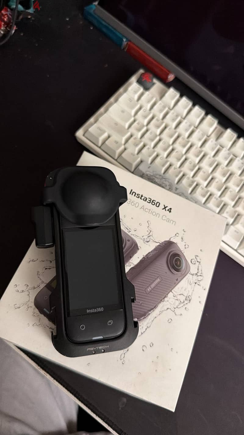 insta360 x4 with mic adapter and cage 5
