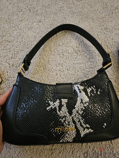 milano and coach bag orignal