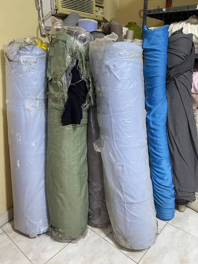Selling fabrics, tables, stands, and clothing store supplies