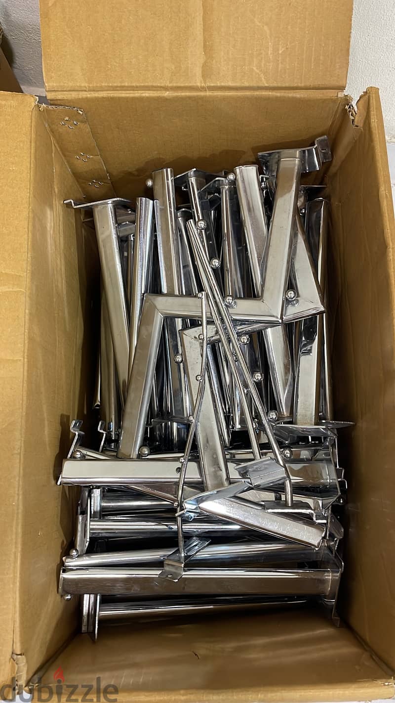 Selling fabrics, tables, stands, and clothing store supplies 3