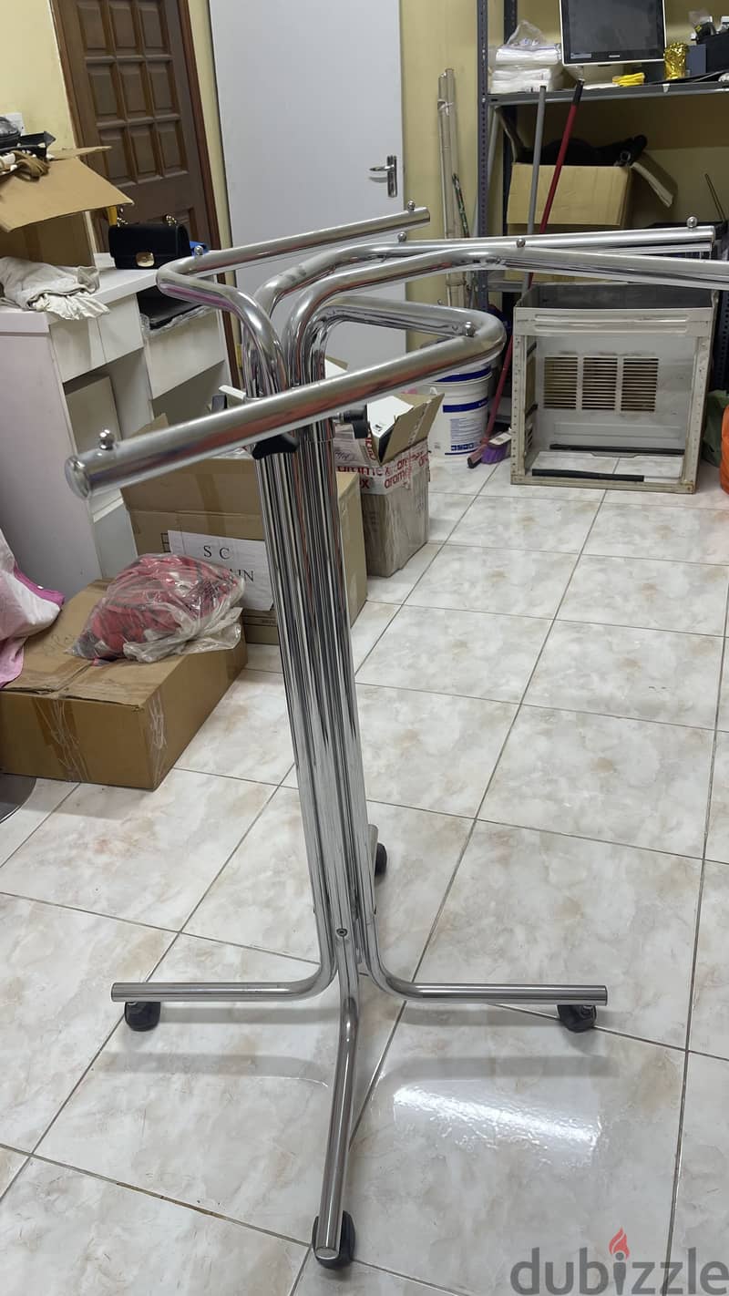 Selling fabrics, tables, stands, and clothing store supplies 7