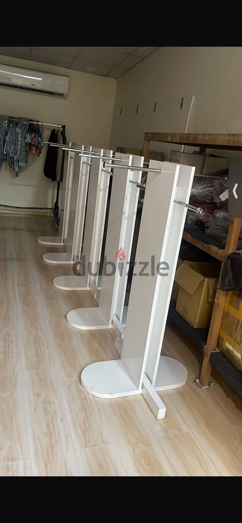 Selling fabrics, tables, stands, and clothing store supplies 8