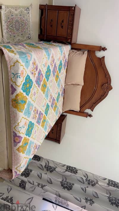 Bed with side table very clean