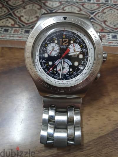 يوجد ساعة يد ماركة Swatch  واصليه ومديل قديمة سعر 120 دينار